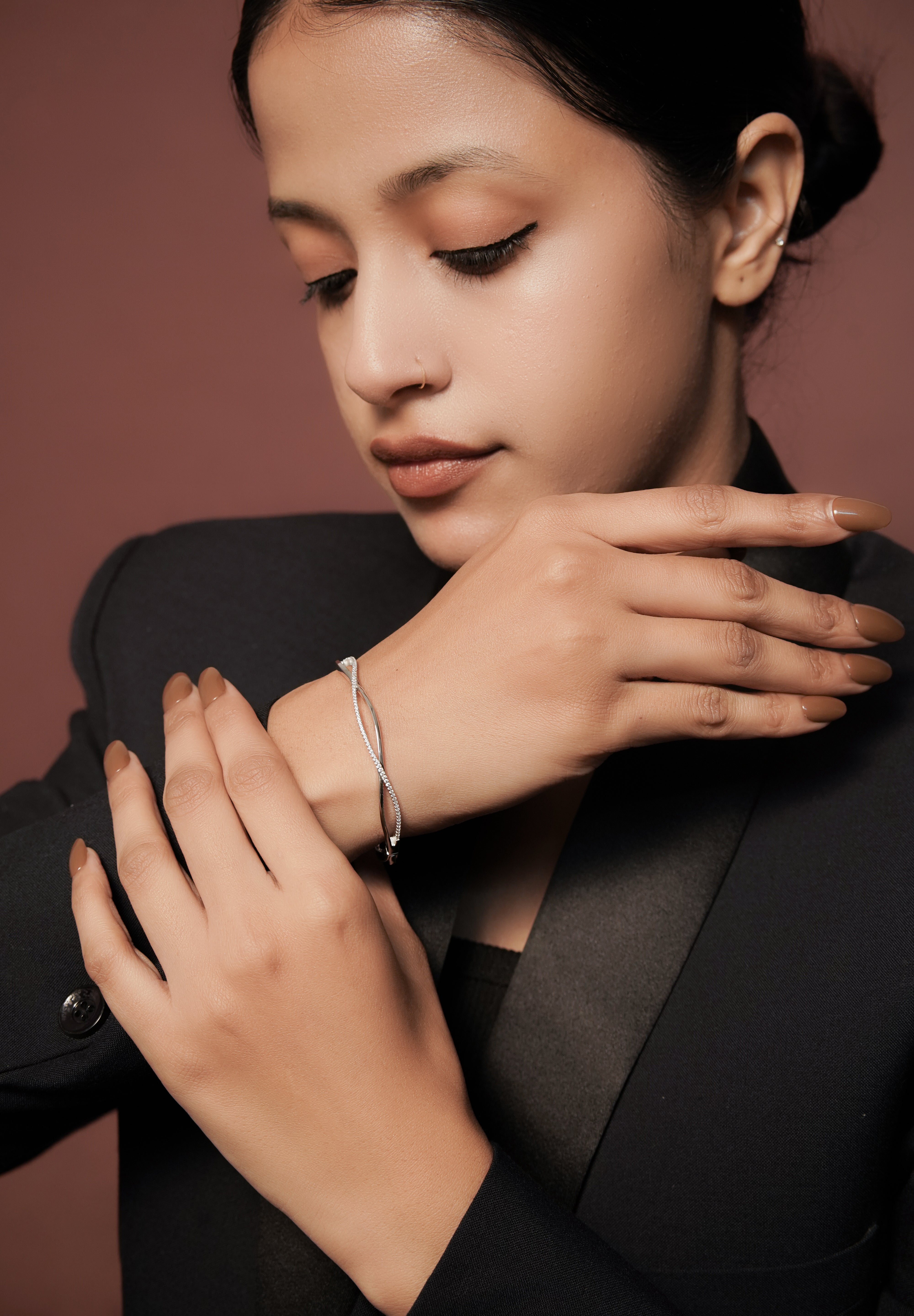 Aura twist bangle