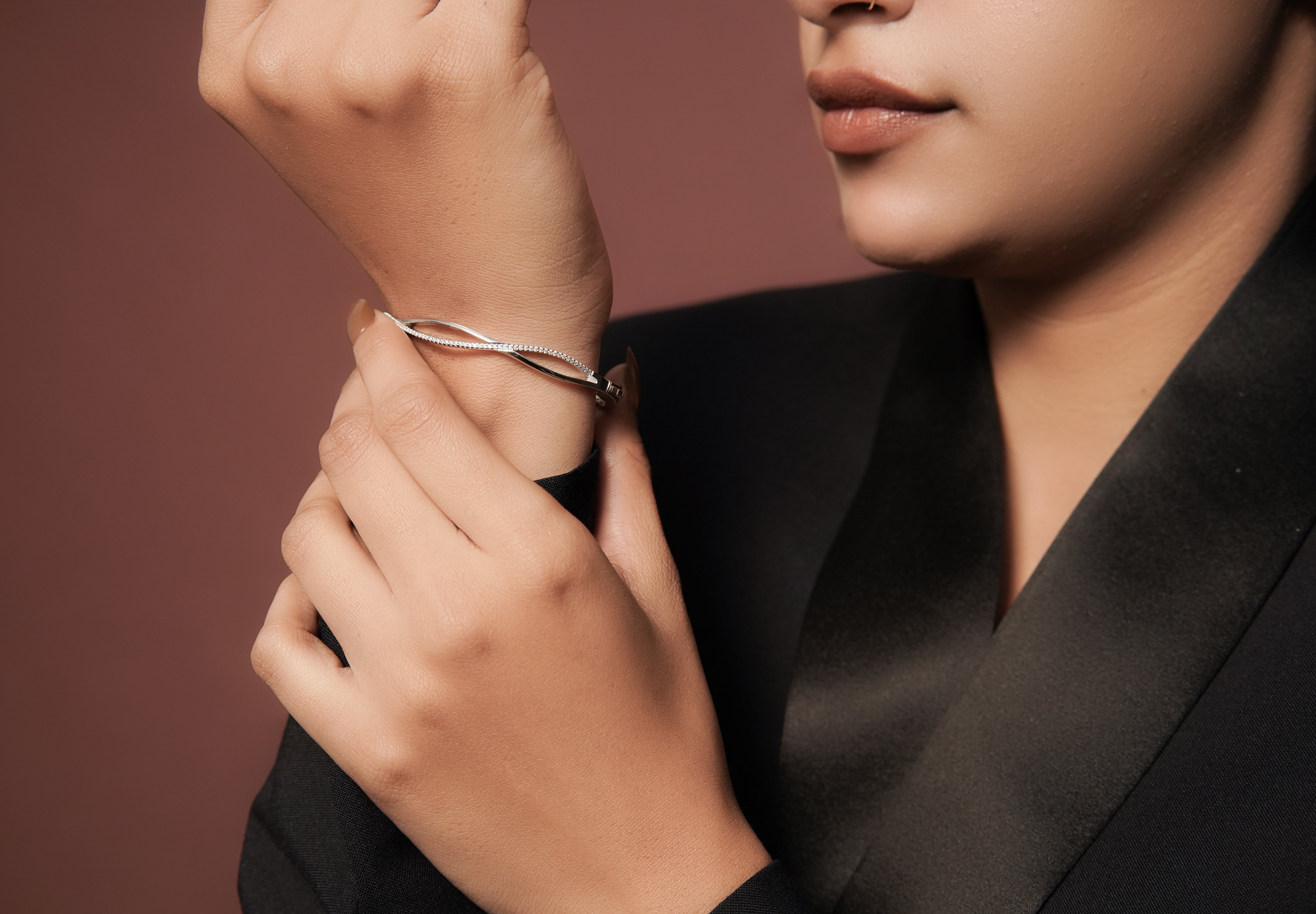 Aura twist bangle