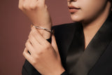 Aura twist bangle