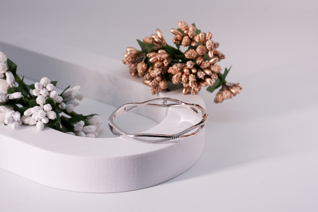 Aura twist bangle