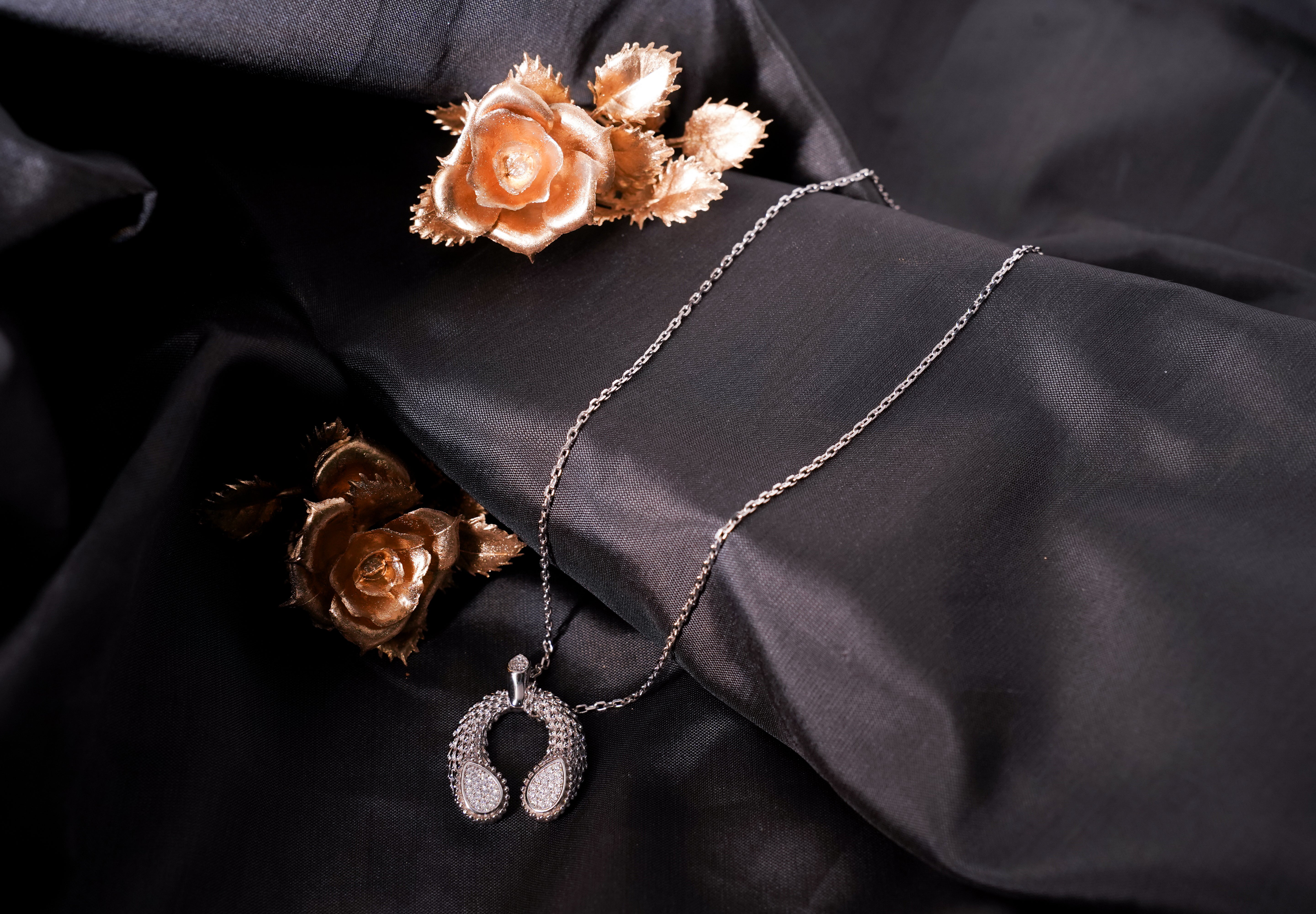 The Pavé Serpentine Pendant