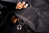 The Pavé Serpentine Pendant