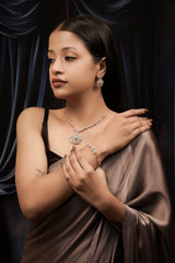 Kyra Radiant Bloom Emerald Pendant Set.