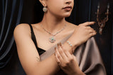 Kyra Radiant Bloom Emerald Pendant Set.